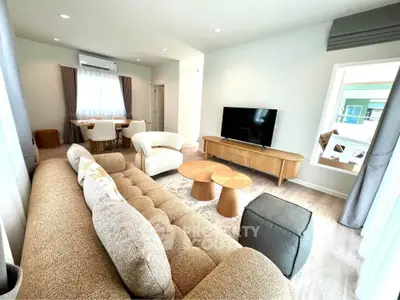 Spacious modern living room with stylish furniture and natural light