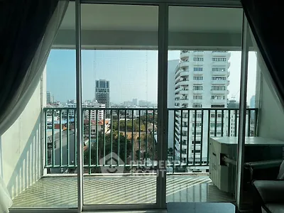 Spacious balcony with city view in modern apartment