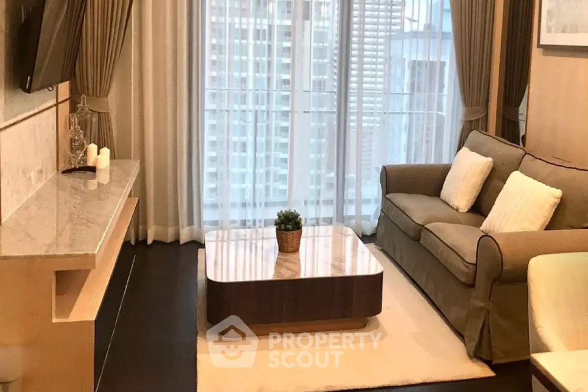 Elegant living room with modern decor and city view, featuring a cozy sofa and stylish coffee table.