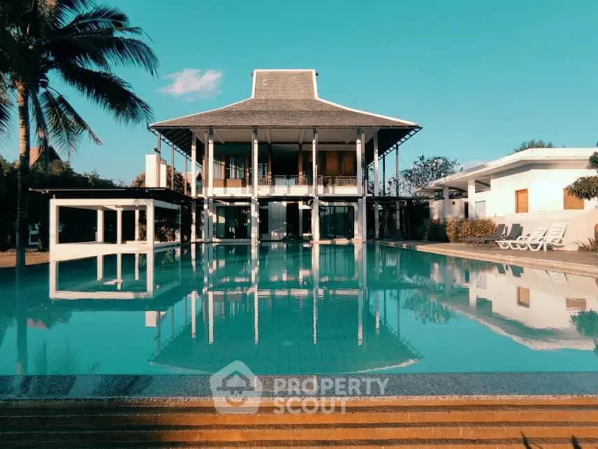 Luxurious villa with stunning pool and modern architecture, perfect for upscale living.