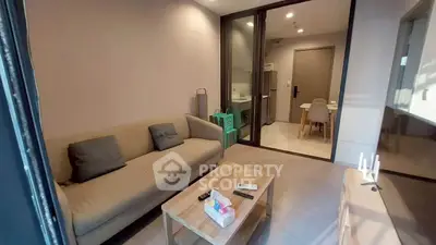Modern living room with cozy sofa and wooden coffee table in stylish apartment