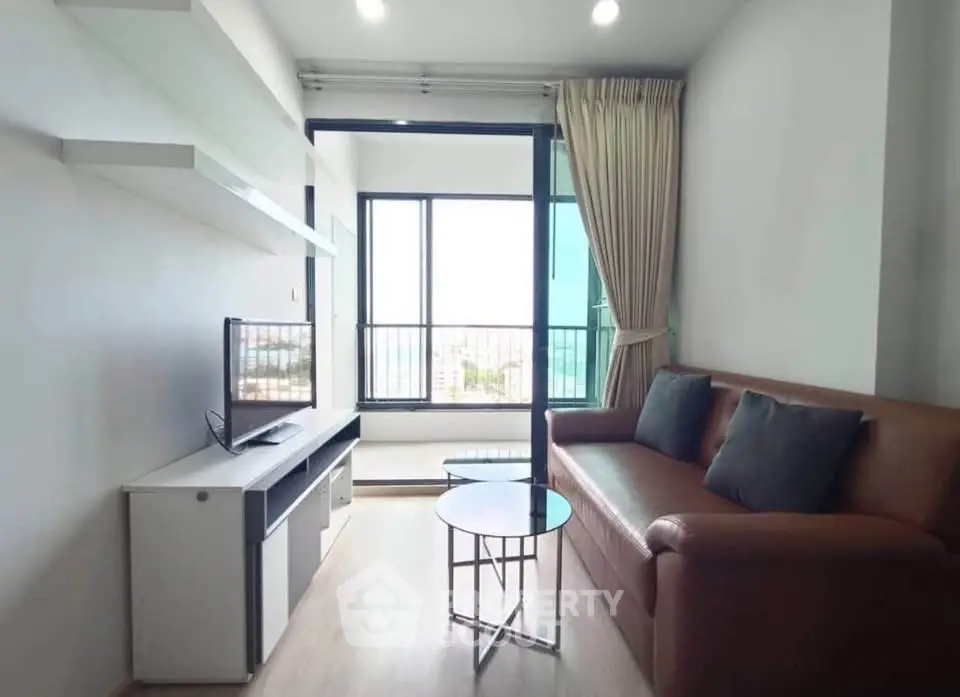 Modern living room with balcony view in stylish apartment