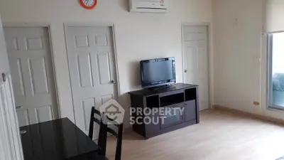 Modern living room with sleek TV stand and minimalist decor