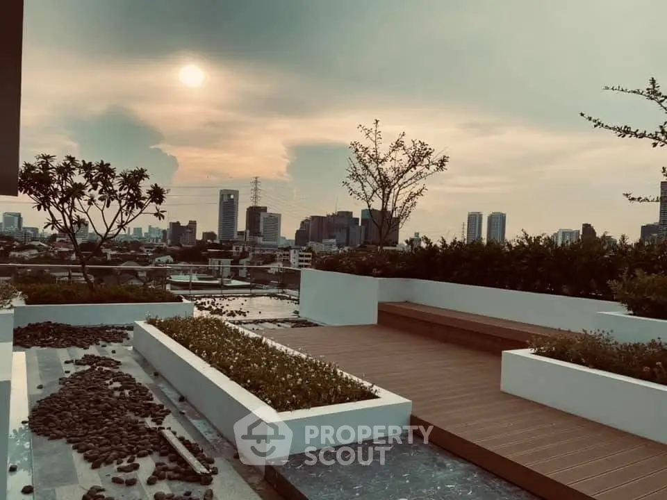 Stunning rooftop view with modern cityscape and elegant landscaping.