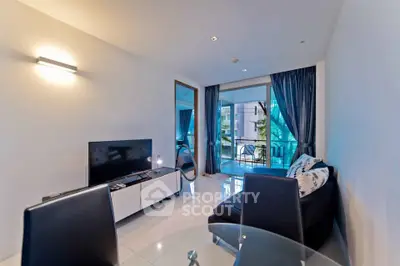 Modern living room with sleek furniture and balcony view in luxury apartment