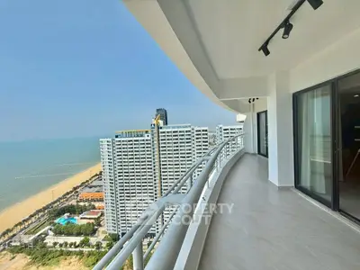 Stunning high-rise balcony with breathtaking ocean view and modern design.