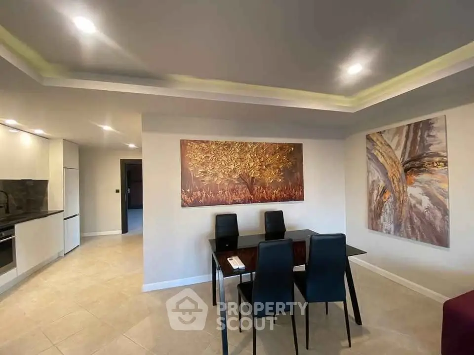 Modern dining area with stylish decor and open kitchen layout