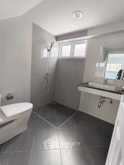 Modern bathroom with sleek fixtures and natural light