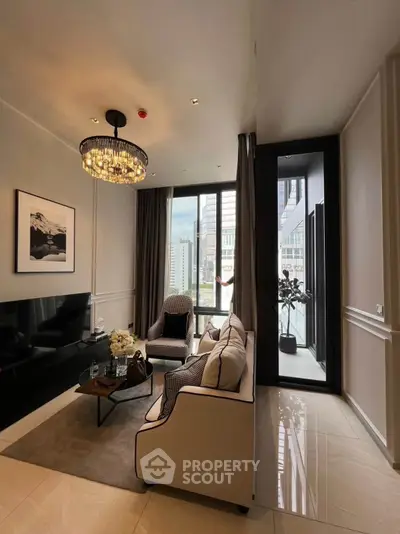 Luxurious living room with elegant decor and city view, featuring a chic chandelier and modern furniture.