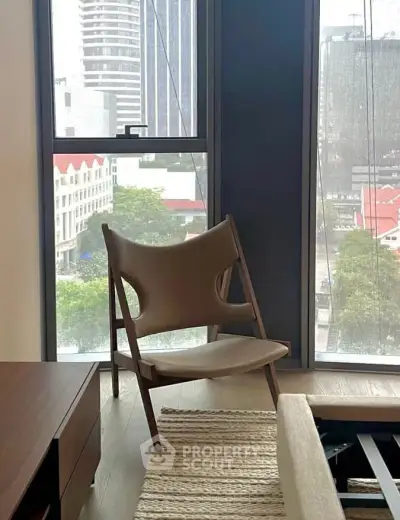 Stylish modern living room with city view and designer chair