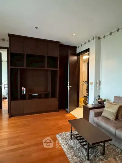 Cozy living room with wooden flooring and modern furniture