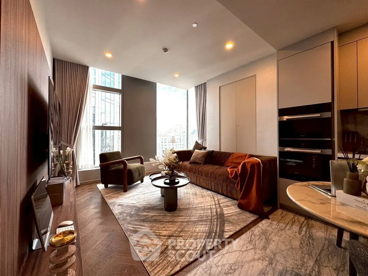 Luxurious modern living room with elegant decor and large windows offering city views.