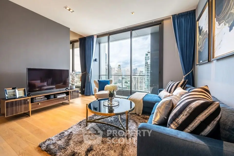 Luxurious living room with city view, modern decor, and spacious balcony access.