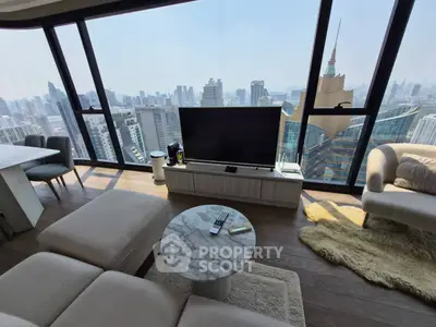 Luxurious living room with panoramic city view and modern furnishings