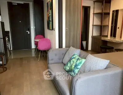 Modern living room with stylish decor and open layout in a contemporary apartment.