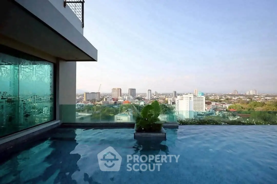 Stunning rooftop pool with panoramic city views, perfect for luxury living.