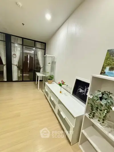 Modern interior with stylish decor and elegant furniture in a well-lit room, showcasing contemporary living space.