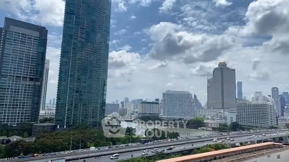 Stunning cityscape view with modern skyscrapers and river, perfect for urban living.