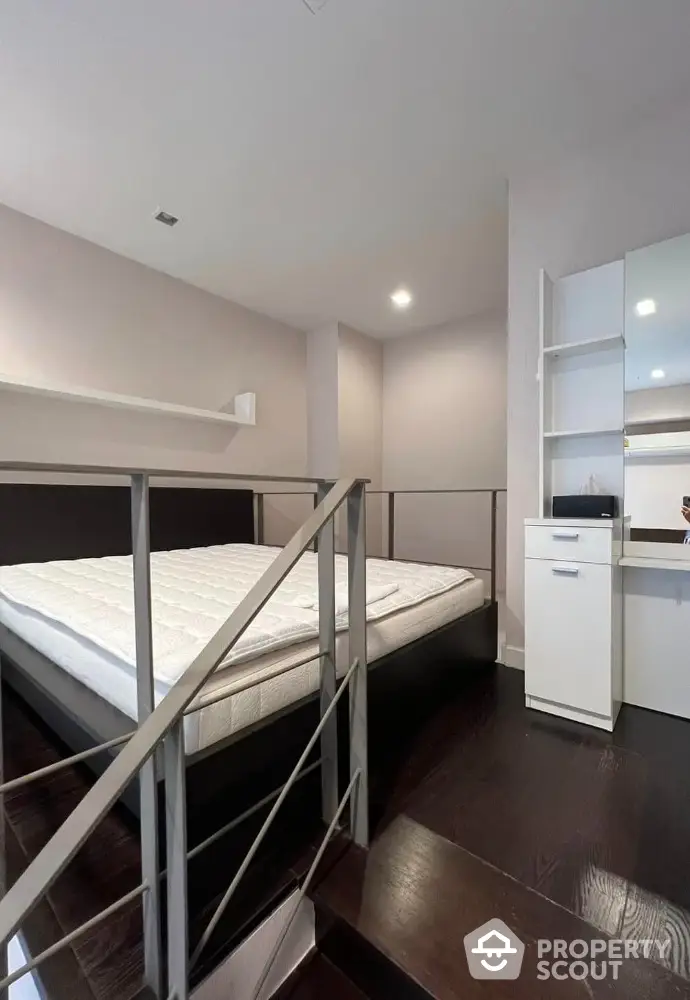 Modern bedroom with sleek design and built-in storage solutions