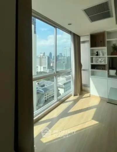 Bright corner unit with stunning city view and modern interior design.