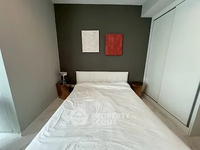 Modern bedroom with minimalist decor and stylish wall art