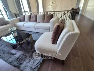 Luxurious living room with elegant furniture and stylish decor in a spacious open layout.