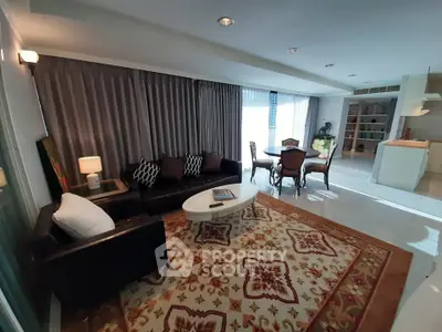 Spacious living room with elegant decor and open kitchen layout