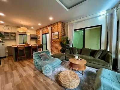 Stylish open-layout living room with modern furniture and cozy ambiance