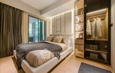 Luxurious bedroom with modern design and walk-in closet, featuring elegant lighting and a serene balcony view.