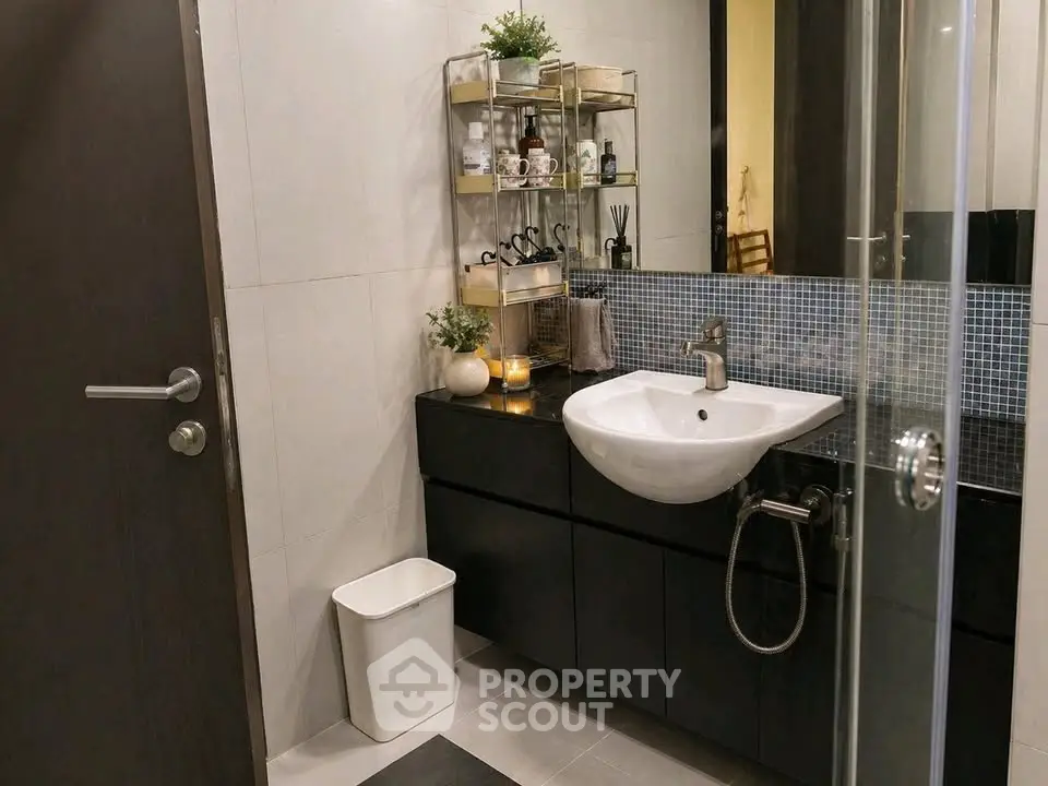 Modern bathroom with sleek sink and stylish shelving