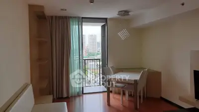 Modern living room with balcony view in urban apartment