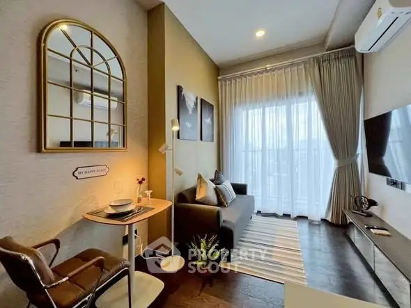 Stylish modern living room with cozy seating and large window view