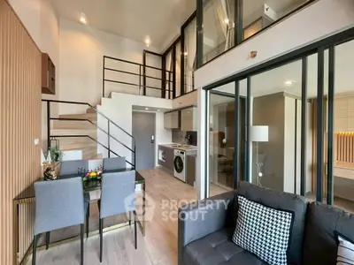 Modern duplex apartment with stylish interior and mezzanine level