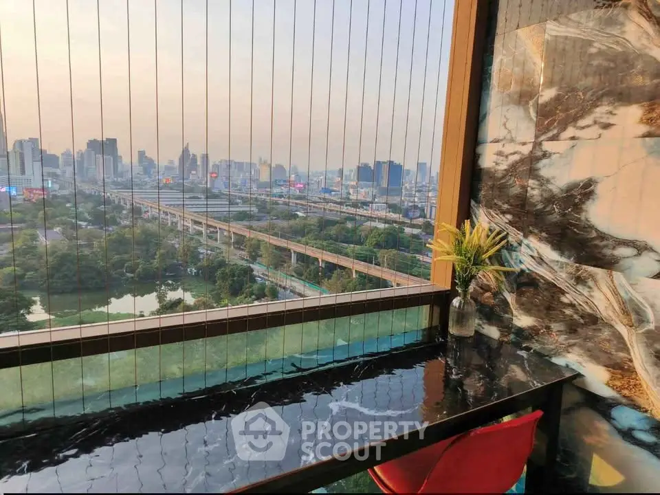 Stunning city view from modern balcony with sleek marble decor