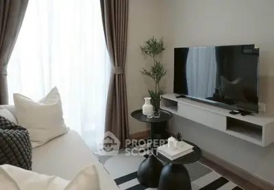 Modern living room with sleek TV setup and stylish decor