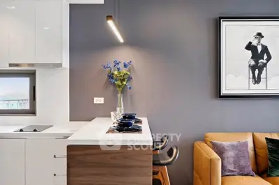 Modern kitchen with sleek design and cozy seating area