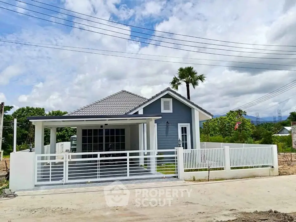 Charming single-story house with modern design and spacious front yard