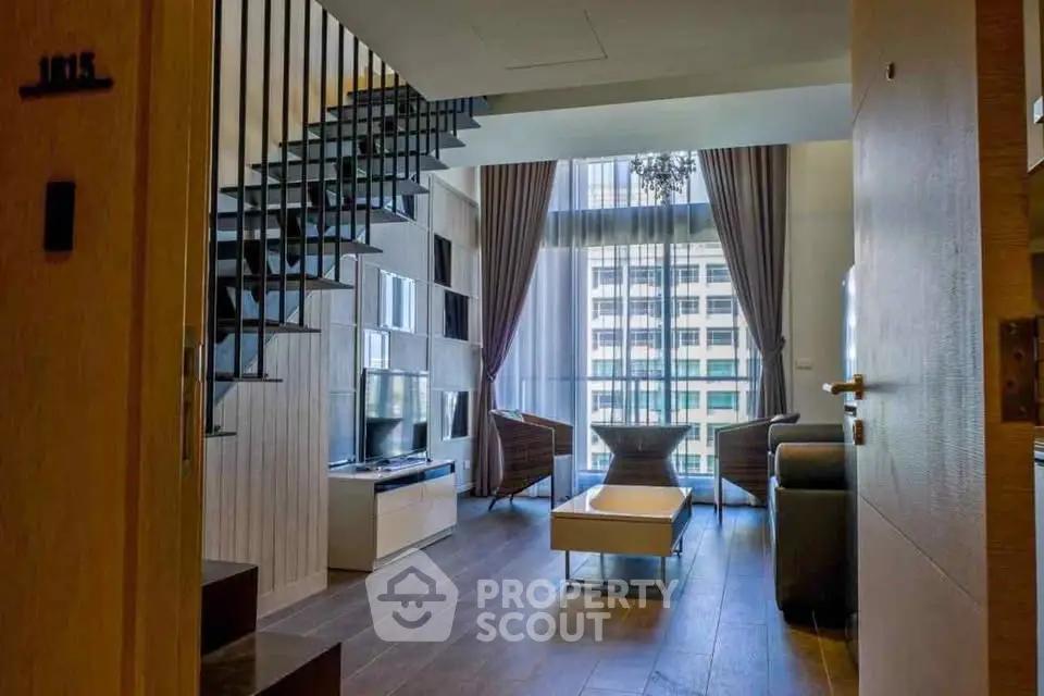 Luxurious modern living room with high ceilings and large windows offering stunning city views.