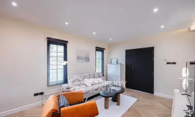 Modern living room with stylish furniture and natural light