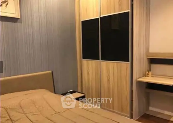 Cozy bedroom with modern wardrobe and stylish decor