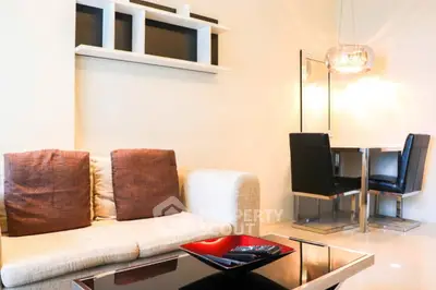 Modern living room with stylish furniture and elegant lighting