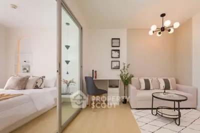 Modern living room with stylish decor and cozy bedroom view