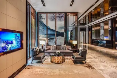 Luxurious modern living room with elegant decor and stunning artwork, perfect for upscale urban living.