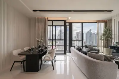 Luxurious modern living room with city view, elegant dining area, and floor-to-ceiling windows.