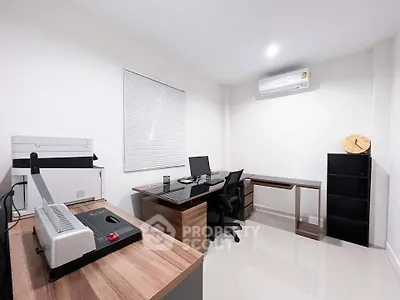 Modern study room with sleek furniture and air conditioning