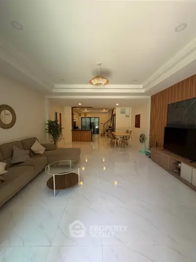 Spacious modern living room with elegant decor and open layout