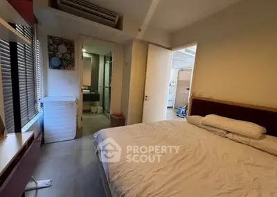 Cozy bedroom with ensuite bathroom and modern decor