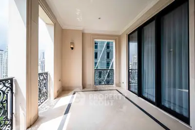 Luxurious balcony with elegant railings and city view in high-rise apartment