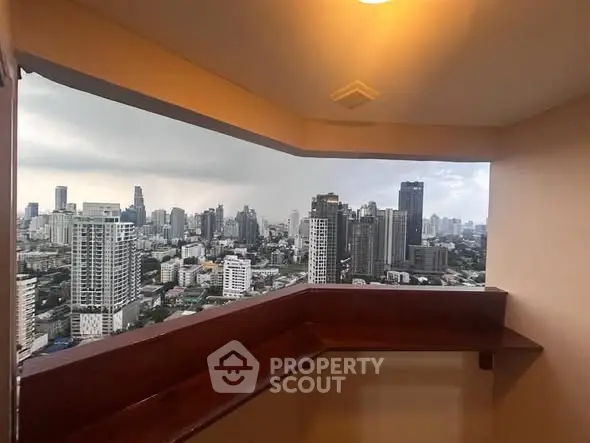 Stunning cityscape view from a high-rise balcony with modern skyline