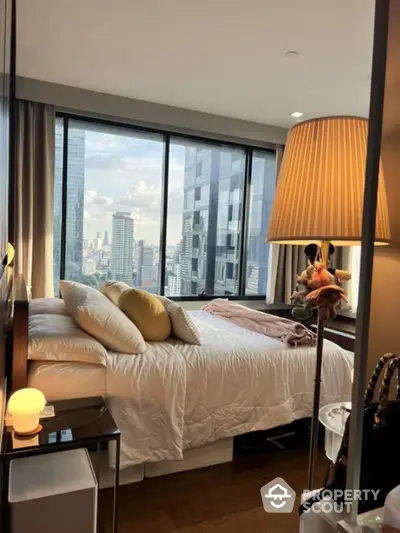 Luxurious bedroom with stunning city view and elegant decor